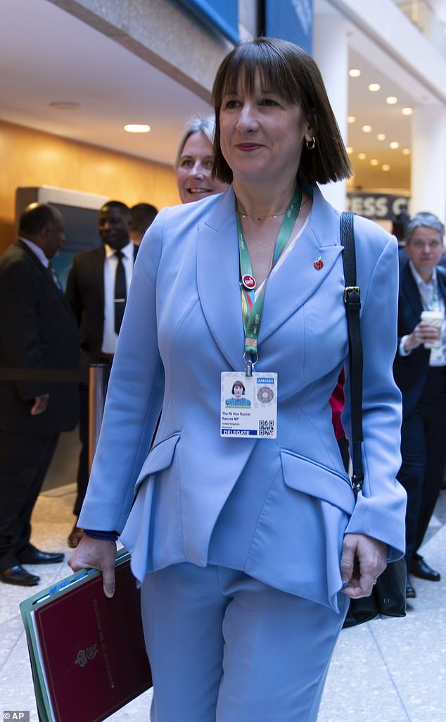 Britain's first female chancellor patrolled the corridors of the IMF headquarters in a light blue trouser suit