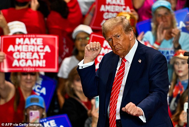 Trump dances as he leaves a campaign rally in Rocky Mount, North Carolina on October 30, 2024