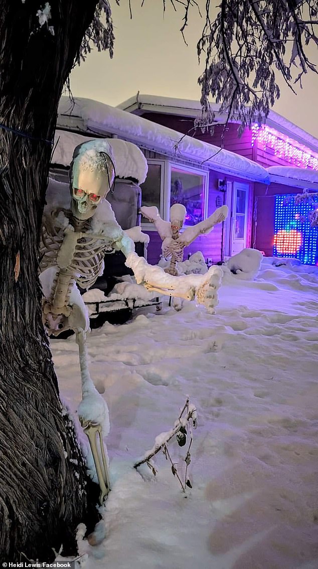 A snowstorm that hit Wyoming on Tuesday left neighborhoods blanketed in snow just before Halloween