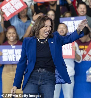 Kamala Harris walks onstage at an event in Phoenix, Arizona