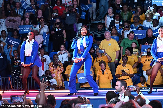 Some were also unimpressed by the celebrities she was on stage with. Pictured: Megan Thee Stallion performs at VP Kamala Harris' presidential campaign rally in Atlanta in a manner called 'unstylish'