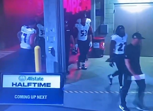 Australian NFL star Daniel Faalele appeared reluctant to be separated from his teammates by a concrete pillar as the Baltimore Ravens entered the locker rooms on Tuesday