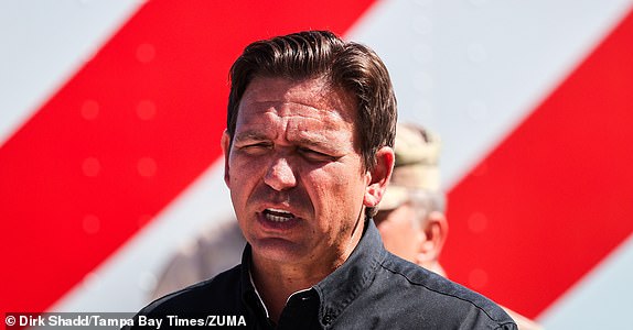 Mandatory Credit: Photo by Dirk Shadd/Tampa Bay Times/ZUMA Press Wire/Shutterstock (14752866d) Governor Ron DeSantis with the flag on a Walmart truck pictured behind him during a news conference near John's Pass Village on Wednesday, October 2, 2024 in Madeira Beach . Florida News, Madeira Beach, USA - October 2, 2024