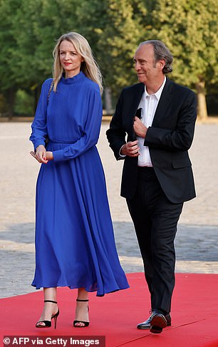 Station F founder Xavier Niel and his wife Louis Vuitton Executive Vice President Delphine Arnault