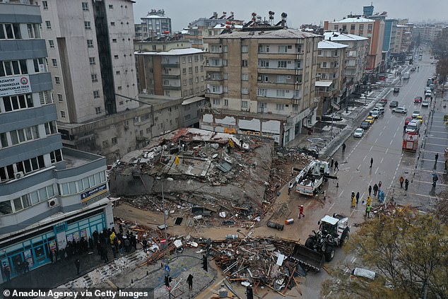 Pictured: An aerial view of a destroyed building in Gaziantep, southern Turkey, 2023. The earthquake - which could be Turkey's largest ever - occurred north of Gaziantep, Turkey, which is about 90 kilometers from the Syrian border and has a population of approximately 2 million