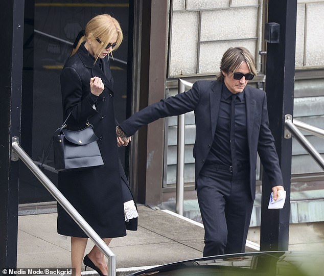 At her mother Janelle's funeral on Tuesday, the actress, 57, was supported by her husband Keith Urban (both pictured) and their daughters Sunday Rose, 16, and Faith Margaret, 14.