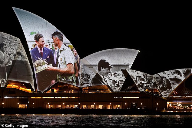 The Sydney Opera House is illuminated with a royal projection to officially welcome the King