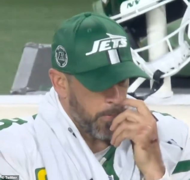 Was it a pick or a scratch? And why was Aaron Rodgers' index finger around his mouth?