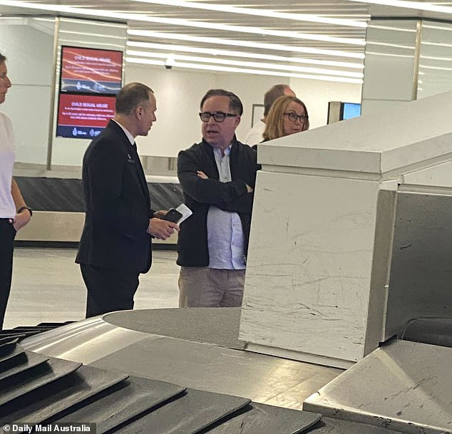 Former Qantas CEO Alan Joyce was seen waiting for his luggage at Sydney airport early on Monday morning