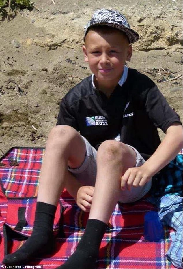 Love is pictured wearing an All Blacks top when he was a schoolboy