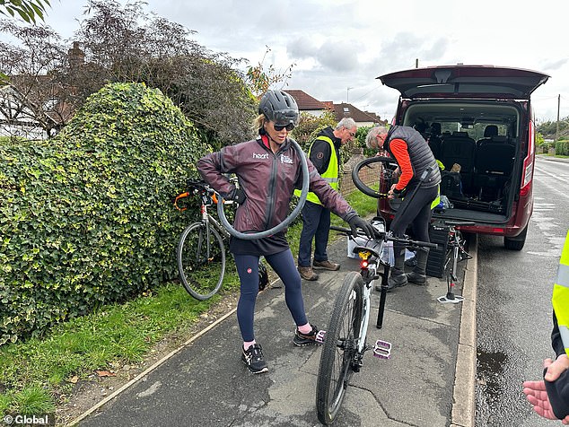 As if the first delay wasn't annoying enough, Amanda had to get off her bike for the second time due to a new flat tire