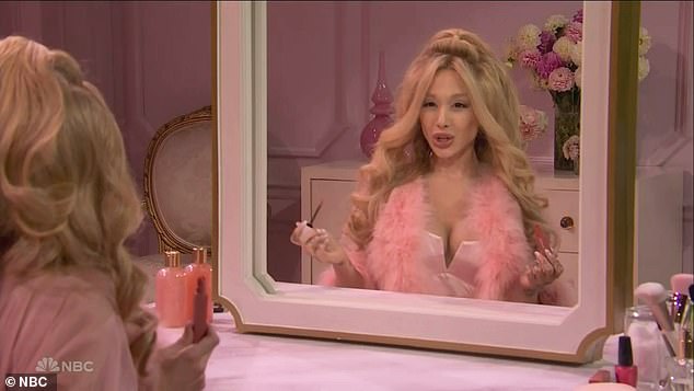 Ariana Grande, 31, got laughs in a Saturday Nigh Live skit in which she impersonates comic icon Jennifer Coolidge in a fake commercial for Maybelline lip gloss. She served as the episode's host