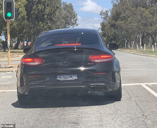 The cheeky number plates were spotted on the back of a black Mercedes C-Class sedan in Perth