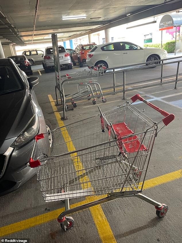 Australians have attacked a customer for a selfish parking move after dumping a Coles shopping cart (pictured) just meters away from a shopping cart