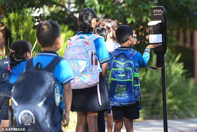 Health officials have issued a public health warning as gastroenteritis cases rise to their highest levels in years, with young children most at risk (pictured, students in Melbourne)