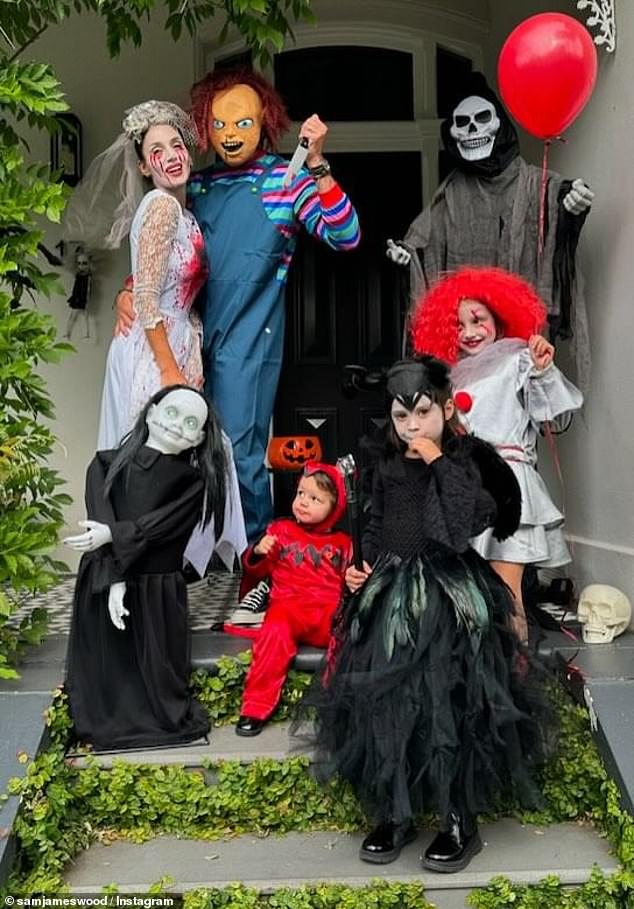 Sam, 44, and Snezana Wood, 43, went above and beyond with their Halloween costumes this year as they put on a bloody display for their neighbors. Pictured