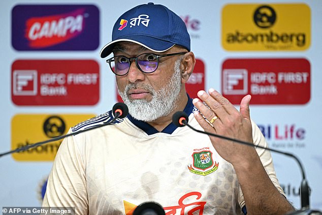 Chandika Hathurusinghe (pictured) will be sacked by Bangladesh after allegedly punching a player during last year's World Cup