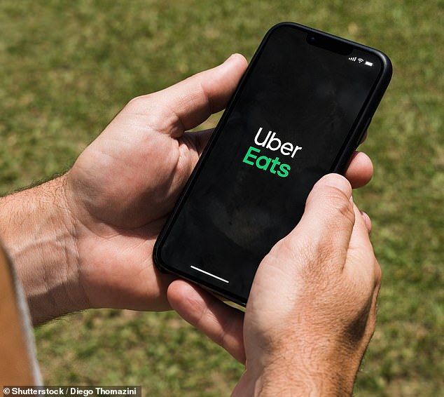 The woman's fiance racked up $9,000 in debt after spending money on Uber Eats and Afterpay over a two-year period and took out a high-interest loan to consolidate his debt (Uber Eats app stock photo )