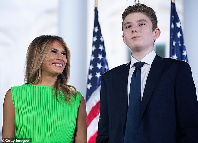 Former first lady Melania Trump (left) writes about dealing with the 'cancel mob' after leaving the White House in 2021, claiming even son Barron (right) couldn't open a bank account. The two are photographed at the White House in August 2020