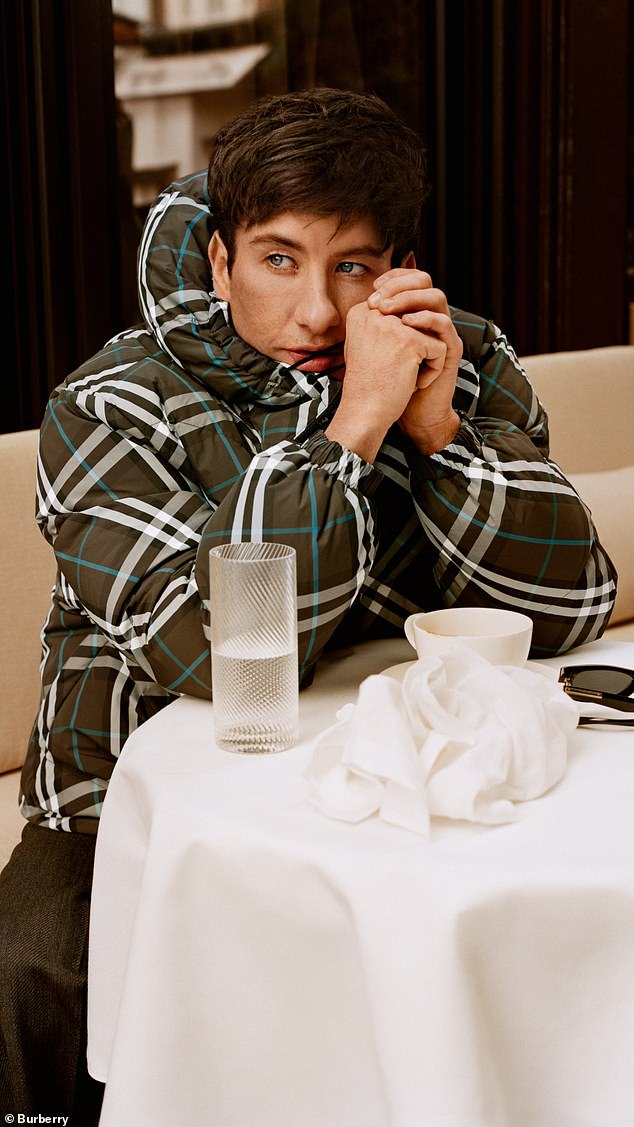 Barry Keoghan wrapped up warm in a khaki and white checked coat as he took part in Burberry's new outerwear campaign