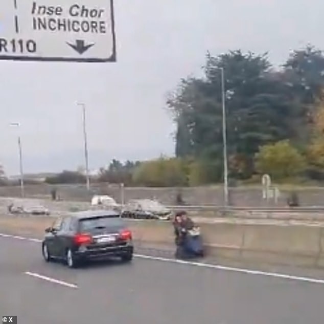 A cheeky pensioner was spotted driving the wrong way on a mobility scooter on a busy highway on the outskirts of Dublin