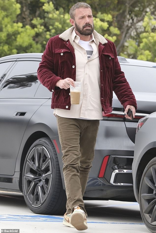 Ben Affleck looked stern during a coffee run in Los Angeles with his assistant Gigi Fouquet on Tuesday – amid his split from Jennifer Lopez