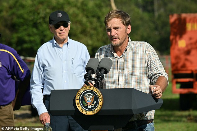 President Joe Biden bowed his head during a tearful prayer at a pecan farm in Georgia, which suffered devastating losses as Hurricane Helene