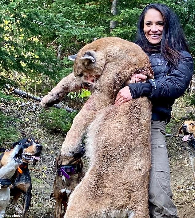 Three big game hunters, including Andrea Major (pictured), are facing wildlife charges after allegedly charging clients thousands of dollars to hunt mountain lions and transport them across the country