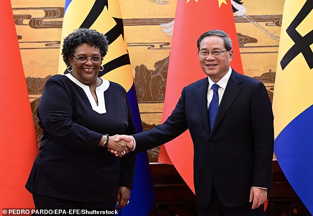 Chinese Premier Li Qiang (R) shakes hands with Prime Minister of Barbados Mia Mottley at the Great Hall of the People in Beijing, China, in June 2023