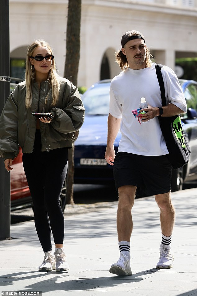 NRL star Ryan Papenhuyzen cut a nonchalant figure on Saturday as he stepped out with new girlfriend Emma Mac