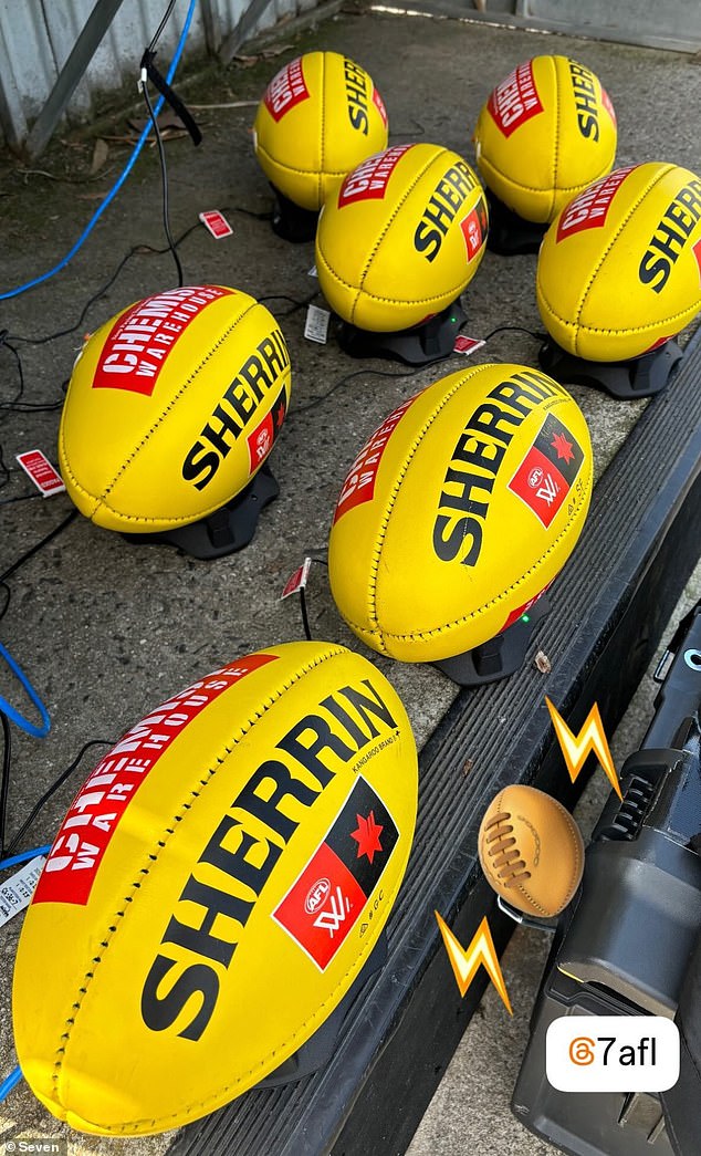 The AFLW uses chipped balls to make real-time scoring decisions, but they need to be charged before the match in order to work (pictured)