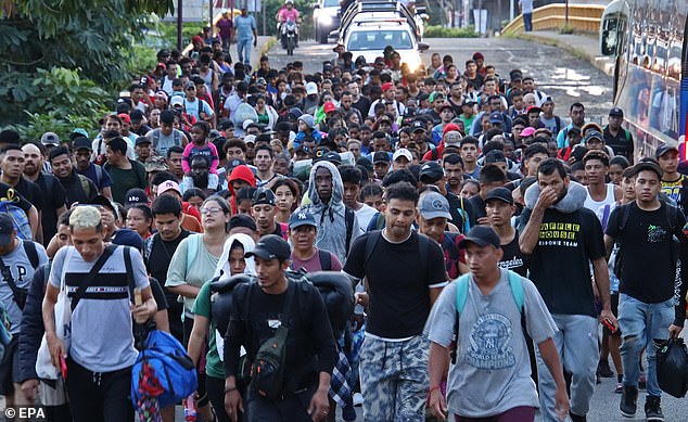 A caravan of migrants makes its way towards the US southern border with just two weeks until the 2024 presidential election