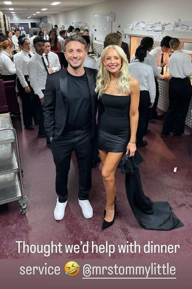 Carrie Bickmore, 43, (right) and Tommy Little, 39, (left) were seen cuddling for a backstage photo at the ACRAs on Saturday night amid romance rumors