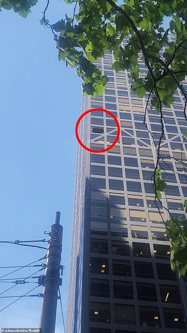 The shocking incident occurred on Tuesday afternoon when the glass window (circled) at the corner of Bourke and William Streets in Melbourne's CBD smashed into the ground, injuring a pedestrian.