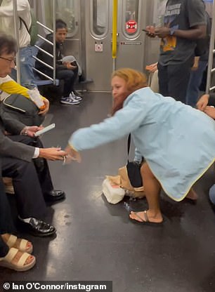 One calm passenger sat holding the crab while most of the passengers rushed to get away from the sea creatures