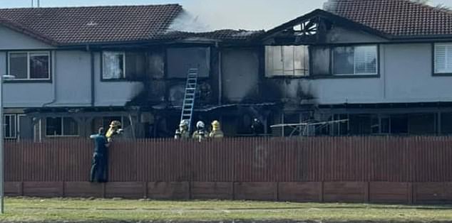 A woman and child are feared dead after a fire destroyed a unit in Thornside, south of Brisbane, about 7.15am on Sunday (pictured)