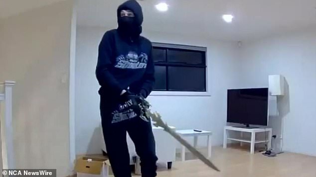 The stylized sword and one of the burglars can be seen here