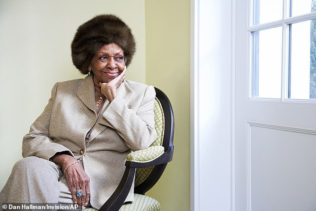 Cissy Houston's family is 'devastated' by her death. The Grammy-winning matriarch, whose glittering career saw her sing alongside icons such as Elvis Presley and Aretha Franklin, died Monday morning at her home in New Jersey.