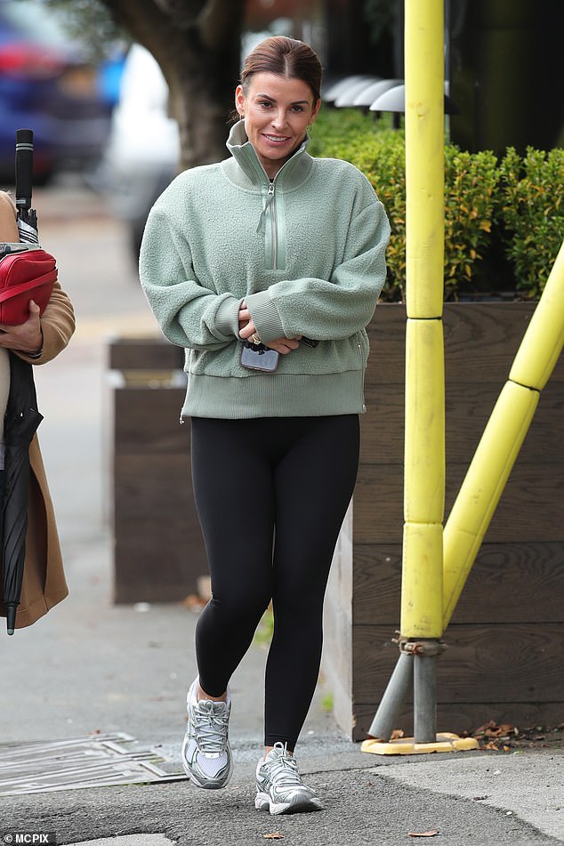 Coleen Rooney looked in good spirits as she enjoyed lunch with friends in Wilmslow on Monday after reportedly signing up for I'm A Celebrity...Get Me Out Of Here