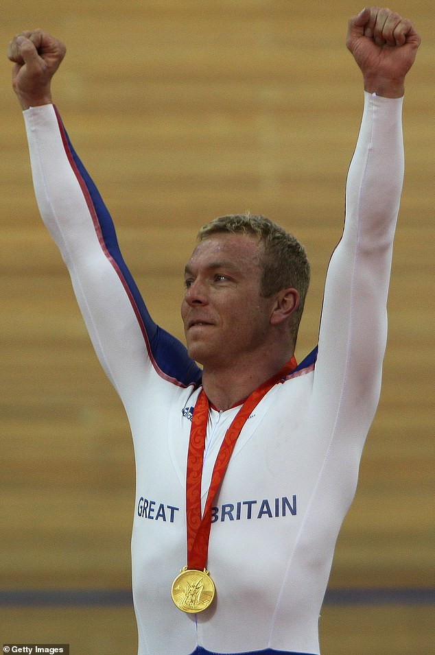 Sir Chris Hoy celebrates winning a gold medal in the keirin at the 2008 Beijing Olympics