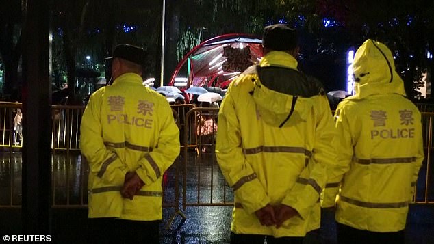 Footage captured Shanghai police officers patrolling a local park as revelers celebrated in fancy dress