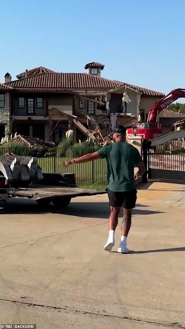 Dak Prescott was seen near his home when it was demolished by a bulldozer on Tuesday