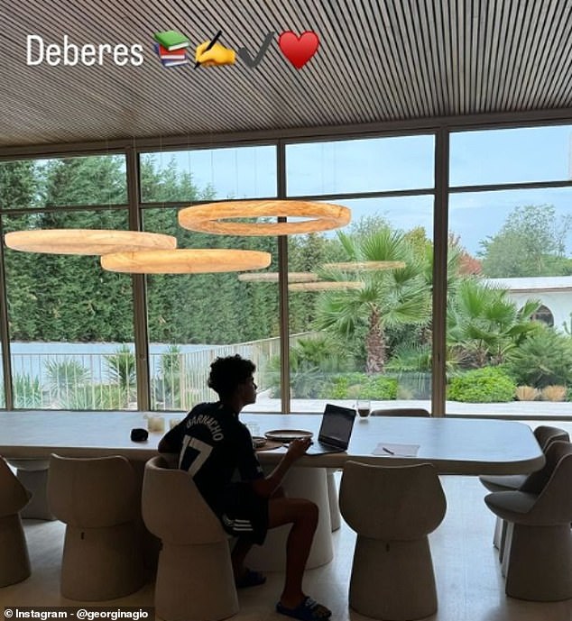 Cristiano Ronaldo Jr wore Man United star Alejandro Garnacho's shirt as he did homework