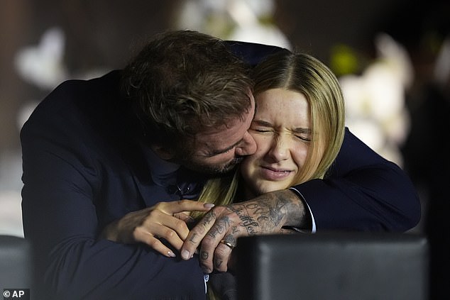 David Beckham planted a kiss on his daughter Harper's cheek on Friday as they attended a soccer match between Inter Miami CF and Atlanta United FC in Fort Laurderdale, Florida