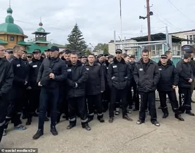 Russian prisoners are filmed as they are recruited by Wagner chief Yevgeny Prigozhin to fight in Ukraine in September 2022