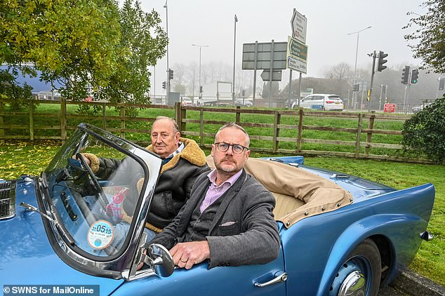 On the road: Reporter Toby Walne gets a ride with motorist Brian Staples in his 1961 Daimler Dart