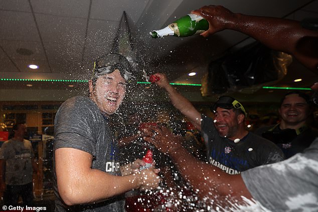 Shohei Ohtani was covered in champagne after helping the Dodgers reach the World Series