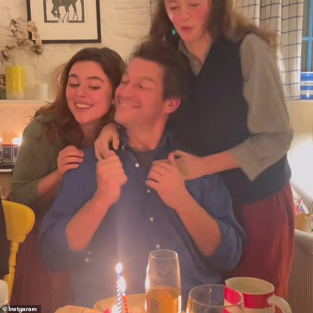 Dominic West beamed as he celebrated his 55th birthday with his look-alike daughters Martha (L) and Dora (R) last week