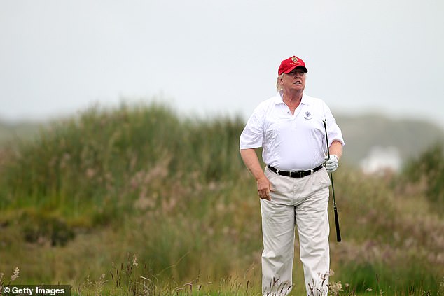 The 18-hole MacLeod Course is located next to the original links, which opened in 2012 after a long, controversial planning process (Photo: Donald Trump plays a round of golf after the opening of The Trump International Golf Links Course on July 10, 2012)