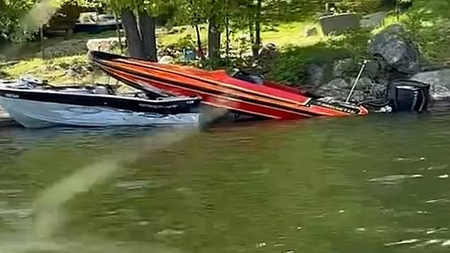 Footage showed a red speedboat with the name 'Y Wouldn't Ya' on it stacked on top of the wreckage